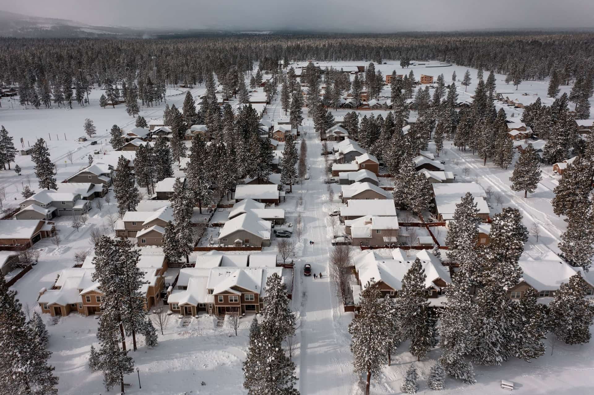 Aerial view of a snow-covered Greenlee roof in Central Oregon